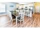 Spacious dining area next to kitchen featuring a large table with seating for ten at 1614-B S Ocean Blvd., Surfside Beach, SC 29575