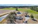 Expansive aerial view featuring the house, barn, and lush green fields at 1751 Nichols Hwy., Aynor, SC 29511