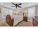 Cozy bedroom showcasing a wooden bed frame, matching nightstands, and soft natural light at 1751 Nichols Hwy., Aynor, SC 29511