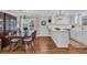 Charming dining area featuring classic wood furniture and a seamless flow into the kitchen at 1751 Nichols Hwy., Aynor, SC 29511
