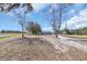 Charming home exterior with a long, sandy driveway leading up to the house at 1751 Nichols Hwy., Aynor, SC 29511