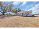 Inviting single-story home featuring a classic facade, front porch, and spacious front yard under a sunny sky at 1751 Nichols Hwy., Aynor, SC 29511