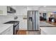 Well-equipped kitchen showcasing stainless steel appliances, white cabinets, and subway tile backsplash at 1751 Nichols Hwy., Aynor, SC 29511