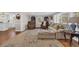 Comfortable living room with a plush sofa, accent chairs, and large windows that fill the room with natural light at 1751 Nichols Hwy., Aynor, SC 29511