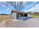 Practical outbuilding featuring storage and workspace, set on a gravel area at 1751 Nichols Hwy., Aynor, SC 29511