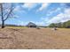 Vast property featuring a barn and multiple sheds under a clear sky at 1751 Nichols Hwy., Aynor, SC 29511