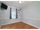 Bedroom with hardwood floors and gray accent walls at 1916 Jasper St., Georgetown, SC 29440