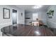 Inviting dining area with rustic accents, seating, and view into the bathroom at 1916 Jasper St., Georgetown, SC 29440