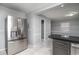 Modern kitchen featuring stainless steel appliances, marble floors, and sleek countertops at 1916 Jasper St., Georgetown, SC 29440