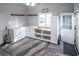Functional mud room with built-in storage, seating, and natural light at 1916 Jasper St., Georgetown, SC 29440