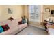 Comfortable home office with a futon, window, and storage space at 195 Cupola Dr., Longs, SC 29568