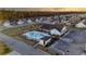 Community pool with lounge chairs and well-maintained landscaping at 195 Cupola Dr., Longs, SC 29568