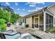 Spacious backyard with a cozy screened-in porch and patio for entertaining guests at 196 Rose Water Loop, Myrtle Beach, SC 29588