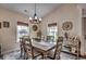Cozy dining area featuring a rustic table, stylish decor, and plenty of natural light at 196 Rose Water Loop, Myrtle Beach, SC 29588