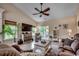 Inviting living room featuring a ceiling fan, comfortable seating, and a sliding glass door at 196 Rose Water Loop, Myrtle Beach, SC 29588