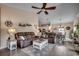 Spacious living room open to dining area, featuring comfortable seating and stylish decor at 196 Rose Water Loop, Myrtle Beach, SC 29588