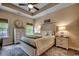 Relax in this main bedroom with a trey ceiling, lots of natural light and coordinated bedside tables at 196 Rose Water Loop, Myrtle Beach, SC 29588