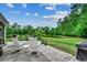 Relaxing outdoor patio with rocking chairs and a picturesque view of the serene pond at 196 Rose Water Loop, Myrtle Beach, SC 29588