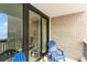 Balcony with brick walls offering a view of the ocean and sliding glass doors at 200 76Th Ave. N # 410, Myrtle Beach, SC 29572