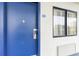 Exterior of a building featuring a blue door with a keycode lock and window at 200 76Th Ave. N # 410, Myrtle Beach, SC 29572