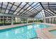 Indoor pool area featuring ample natural light from a glass roof and surrounding windows at 200 76Th Ave. N # 410, Myrtle Beach, SC 29572