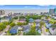Breathtaking aerial view showcases colorful beach homes near the ocean and nearby cityscape at 209B Woodland Dr., Murrells Inlet, SC 29576