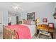 Cozy bedroom featuring rustic wood furniture, soft lighting and decor with a bear theme at 209B Woodland Dr., Murrells Inlet, SC 29576