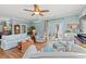 Inviting living room with ample seating, wooden floors, and sliding doors to the outdoors at 209B Woodland Dr., Murrells Inlet, SC 29576