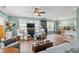 Spacious living room with hardwood floors, plenty of natural light, and stylish furnishings at 209B Woodland Dr., Murrells Inlet, SC 29576