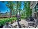 Backyard patio with grill, seating and lush green space at 2131 Timmerman Rd., Myrtle Beach, SC 29588