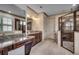 Stylish bathroom with granite countertops, double sinks, and a glass-enclosed shower at 2131 Timmerman Rd., Myrtle Beach, SC 29588