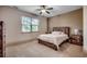 Neutral bedroom featuring rustic furniture, plush carpet and lots of natural light at 2131 Timmerman Rd., Myrtle Beach, SC 29588