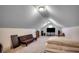 Attic bonus room with carpet, sofa, TV and bed at 2131 Timmerman Rd., Myrtle Beach, SC 29588