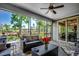 Relaxing covered patio featuring wicker furniture, a ceiling fan, and sliding glass doors at 2131 Timmerman Rd., Myrtle Beach, SC 29588