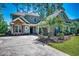 Charming home with stone accents, well-manicured lawn, and spacious driveway on a sunny day at 2131 Timmerman Rd., Myrtle Beach, SC 29588