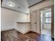Upstairs hallway features wood floors, neutral paint and bathroom with shower visible at 2131 Timmerman Rd., Myrtle Beach, SC 29588