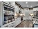 Modern kitchen with stainless steel appliances, granite countertops, and updated cabinets at 2131 Timmerman Rd., Myrtle Beach, SC 29588