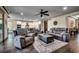Spacious living room featuring comfortable seating, modern lighting, and an open layout leading into the kitchen at 2131 Timmerman Rd., Myrtle Beach, SC 29588