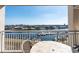 Inviting balcony view of a waterway with boats, waterfront homes, and a vibrant cityscape in the background at 2151 Bridge View Ct. # 2705, North Myrtle Beach, SC 29582