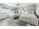 Bright bedroom with two beds and coastal decor. Hardwood floors and neutral paint at 2151 Bridge View Ct. # 2705, North Myrtle Beach, SC 29582