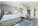 Bedroom with 2 beds, ceiling fan and an entrance to an ensuite bathroom at 2151 Bridge View Ct. # 2705, North Myrtle Beach, SC 29582