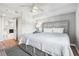 Bedroom with a queen bed, ceiling fan and an entrance to an ensuite bathroom at 2151 Bridge View Ct. # 2705, North Myrtle Beach, SC 29582