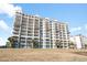 Stunning condo building with expansive balconies and Mediterranean-style architecture at 2151 Bridge View Ct. # 2705, North Myrtle Beach, SC 29582