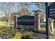 Elegant Yacht Club Villas sign surrounded by colorful landscaping at 2151 Bridge View Ct. # 2705, North Myrtle Beach, SC 29582