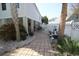 Paver walkway with lush landscaping leading to the backyard with plenty of privacy at 220 Starcrest Circle, North Myrtle Beach, SC 29582