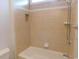 Neutral bathroom with tiled shower and ample storage at 220 Starcrest Circle, North Myrtle Beach, SC 29582