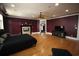 Spacious bedroom features include a cozy fireplace and sleek hardwood floors at 220 Starcrest Circle, North Myrtle Beach, SC 29582