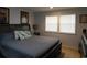 Bedroom showcasing a bed with a padded headboard and neutral bedding at 220 Starcrest Circle, North Myrtle Beach, SC 29582