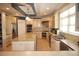 Gourmet kitchen featuring custom cabinetry, stainless steel appliances, and a large center island at 220 Starcrest Circle, North Myrtle Beach, SC 29582