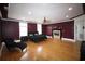 Spacious main bedroom with a fireplace, hardwood floors, and neutral paint at 220 Starcrest Circle, North Myrtle Beach, SC 29582